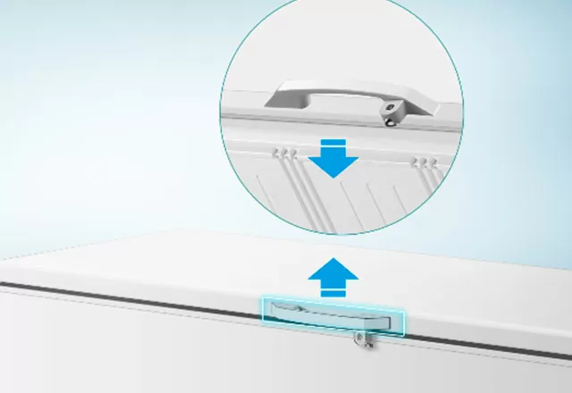 Detailed view of freezer door ergonomic external handle.